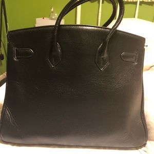 Black purse with silver hardware